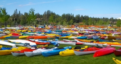 The colorful vessels are arranged next to the river for the participants to grab & go!